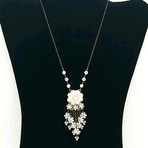 White crystal flower choker necklace.